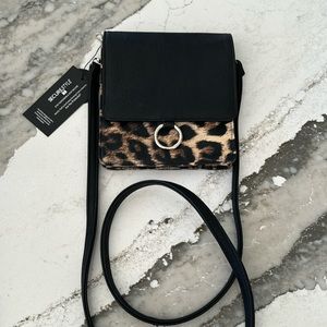 k Carroll over the shoulder bag.  New with tags